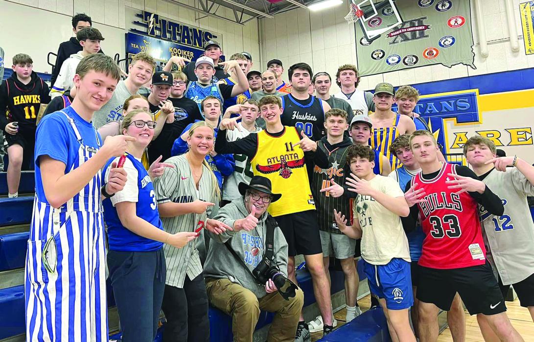 The Elk Point-Jefferson student section rallied around Photographer Steve Peterman on Feb. 27 at Tea. A parent captured this picture showing how important Steve is to the athletic community and the moments he captures through his lens. Submitted photo