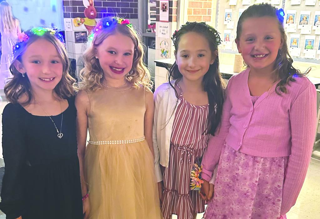 A Daddy-Daughter Dance was hosted by Dakota Valley’s PTO on Saturday, March 9. The event was Taylor Swift themed and drew a crowd of almost 250 attendees. Pictured are, from left, Lenyx Elliott, Karsyn Knowlton, Emma Arreola and Norah Markve. Submitted photos