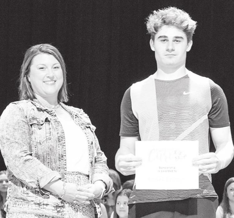 Brodey Ballinger was awarded the Fore The Cure Scholarship. Larissa Kommes presented the award.
