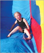 Kids were able to play on a bounce house at Immanuel Lutheran’s Family Fun Night Aug. 28. Photo courtesy of Gary Schaeffer