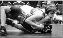 Owen Rigg (113) works to pin his Andes Central/Dakota Christian opponent. Rigg won in 3:30. Photo by Peterman Sports Photography stevepeterman5@gmail.com