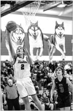 Devon Schmitz makes the lay-up for 2 of his 9 points against Sioux Falls Christian Dec. 17. Photo by Peterman Sports Photography stevepeterman5@gmail.com