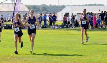 Ella Otten, Alex McCullough and Sophia Redler run strong at the Canton Invite. Photo by Kelly Riibe • times2reporter@gmail.com