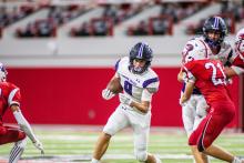 Tyler Schutte had a nice run after catching a pass from Ethan Anema during the game against Vermillion Aug. 26 in the DakotaDome. Photo by Peterman Sports Photography • photoman@iw.net
