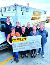 Through their tip donation program, the Coffee Cup Travel Plaza was able to donate $3,569.90 to the Elk Point Community Ambulance Oct. 3. Coffee Cup team members pictured are Erin Robinson, Gail Gautier, Logan Rosenberger, Janet Towner, Barbara Makovicka and Taylor Reddick. Renee Irwin and Cara Kosinski accepted the donation on behalf of the Elk Point Ambulance. Submitted photo