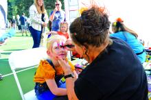 Arie Schipper of Dakota Dunes (top left) got her face painted at the Dakota Dunes Fall Festival, Oct. 2.  Photos by Kelly Riibe • times2reporter@gmail.com