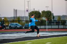 Jaelyn Bacan kicks the ball away from the goal after getting a save against Tea Area Sept. 27. Photo by Peterman Sports Photography • stevepeterman5@gmail.com