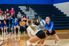 Hannah Nearman bumps the ball to start the play. Photo by Peterman Sports Photography • stevepeterman5@gmail.com