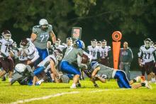 Hunter Geary and Hunter Sharkey hunt down the Tri-Valley quarterback. Photo by Peterman Sports Photography • stevepeterman5@gmail.com