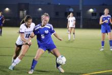 Emma Deacon hustles for the ball against Sioux Falls Christian Oct. 4. Submitted photo