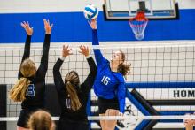 Natalie Heuertz pushes the ball over two Irene-Wakonda blockers for one of her 6 kills on the night. PhotobyPetermanSportsPhotography stevepeterman5@gmail.com