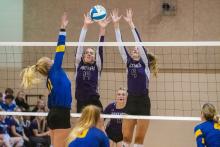 Addi Kleis and Jorja VanDenHul go up for the block. Photo by Peterman Sports Photography stevepeterman5@gmail.com