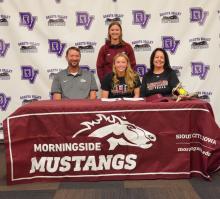 Emma Wiese signed her letter of intent to play softball with Morningside University. Pictured are, front from left, Sam Wiese, Emma Wiese, Kelly Wiese ; and back, Brooke Pruner, Morningside Head Softball Coach. Photo by Kelly Riibe • times2reporter@gmail.com