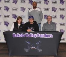 Pictured from front left, are Beth Pruchniak, Jake Pruchniak and Wayne Pruchniak; and back, DV Baseball Coach Rob Augustine. Photo by Kelly Riibe • times2reporter@gmail.com