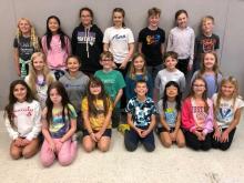 Dakota Valley Elementary Honor Choir participants were, from front left, Sophie Deacon, Lydia Taylor, Berkley Fritchen, Cruz Trejo, Nichole Yang, Caroline Goosmann and Harper Zellmer; middle, Katie Jo Hale, Ava Castillo, Hayes Monical, Lola Trejo, Oliver Kalaher and Haddie Christiansen; and back, Brynn Ramos, Iris Liao, Ametria Watson, Riley Hughes, Charlie Bomgaars, Marlee Olsen and Asher Olsen. Submitted photo