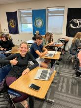 Rachel Bryan (giving the thumbs up) is excited to be in Debate. Sitting next to her is Brayden Karkalik. Submitted photo