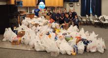 Cub Scout Pack 87 conducted a food drive and donated the items to the Elk Point Food Pantry. Submitted photo
