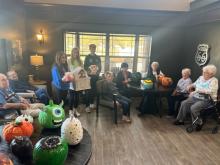 Dakota Valley Middle School Student Council members delivered painted pumpkins to the residents of StoneyBrook Suites in Dakota Dunes. Submitted photo