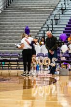 Logan Miller hugs her mom and coach Mary Miller after they recognized her for hitting 2,000 assists in her high school career as setter. Photo by Peterman Sports Photography stevepeterman5@gmail.com