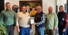 The North Sioux City Economic Development Corporation (NSCEDC) named Calhoun Communications as the November Business of the Month. Pictured are, from left, NSCEDC Executive Director Andrew Nilges, Calhoun Communications, President/COO Tony Carpenter, NSCEDC Board President Mike Huber and NSCEDC Directors John Stevens and Jamie Wankum. Submitted photo