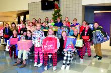 Students from 4th-8th grade gathered up donations to take to Embassy Rehab & Care Center. Pictured are, front from left, Ava Castillo, Eliana Corporon, Baylee Warner, Embrey Lubarski, Sophie Meyer, Audrey Sindt and Katie Betsworth; middle, Bryer Langley, Annabelle Martindale, Mila DeBeer, McKinley Koedam, Ethan Campbell Harrison, Garrett Hanson, Neil Pfeifer, George Schnabel and Marcus Wheeldon; and back, Collins Ward, Cadence Irwin, Vail Krage, Paige Moffatt, Gracie Hamilton, Coryn Kimbell, Aubree Worden, 
