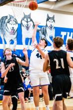 Easton Kempf was a force under the net, putting away 24 points to lead the Husky offense against Madison Dec. 10. Photo by Peterman Sports Photography stevepeterman5@gmail.com