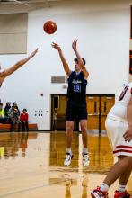 Reed Sayler lets a 3 fly against Viborg-Hurley Dec. 20. Photo by Peterman Sports Photography stevepeterman5@gmail.com