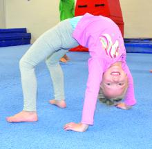 Dakota Pearman, of North Sioux City, showed off her flexibility at the “Winter Break Camp” hosted by V.I.P Gymnastics, Ninja, and Cheer. Photo by Kelly Riibe • times2reporter@gmail.com