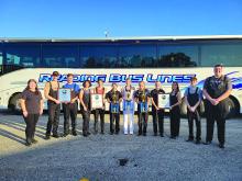 Elk Point-Jefferson Marching Band Seniors proudly display the hardware the band won while in Tampa, FL. Pictured are, from left, Jordan Swanson, Lucas Hemmingstad, Caleb Niles, Izzy Curry, Paetyn Cole, Sophia Giorgio, Aubrey Bousquet, Alicen Colt, Nicole Wells, Alexis Ludwigs, Jacob Peirce and Patrick Kastning. Photo Courtesy of Elk Point-Jefferson Music Boosters