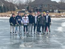 Some of the Sioux City Metros hockey team, including Dakota Valley junior Grant Harder and Dakota Valley freshmen Noah Graham take advantage of the ice-covered pond at Wynstone over the holiday break. Submitted photo