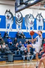 Kayden Moore scores his 2 points against Vermillion Jan. 17. Photo by Peterman Sports Photography stevepeterman5@gmail.com