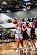 Ella Reifenrath goes up strong against Tri-Valley defenders Jan. 20. Photo by Peterman Sports Photography stevepeterman5@gmail.com