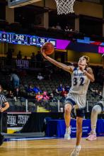 Randy Rosenquist, shown playing against North Community, MN, had a great game against Chamberlain Dec. 30. He was recognized for a triple-double with 12 points, 11 rebounds and 16 assists. Photo by Peterman Sports Photography • stevepeterman5@gmail.com