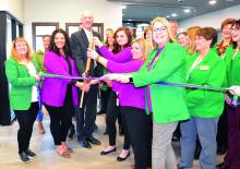 The staff at the North Sioux City’s Peoples Bank were on-hand to cut the ribbon to celebrate the branch’s opening with CEO Al Vermeer, members of the Siouxland Chamber of Commerce and others from the community in attendance. Pictured are, from left, starting in pink shirts: Payton Hendrickson (Lead Customer Service Rep), Al Vermeer (CEO), Hannah Wood (Customer Service Rep), Dawn Nacke (Customer Service Rep) and Wendy Jackson (Retail Banking Officer). Photo by Kelly Riibe • times2reporter@gmail.com