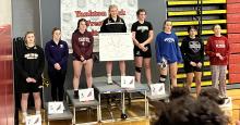 Gracie Delgado, second from the right, took 6th place at the Yankotn Wrestling Invitational Feb. 4. Submitted photo
