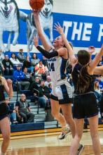 Bentlee Kollbaum goes up strong against Dakota Valley Feb. 2. Photo by Peterman Sports Photography stevepeterman5@gmail.com