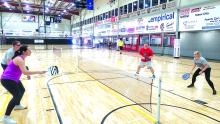 Stephanie Monk and Jim Daffer face off against Kyle Schute and Sherry Carreau in a friendly game of pickleball on Jan. 27 at United Sports Academy in North Sioux City. Photo by Kelly Riibe • times2reporter@gmail.com