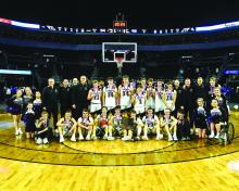 The Dakota Valley Panthers won their second consecutive Class A State Boys Basketball Championship March 18 at the Denny Sanford PREMIER Center March 18. Pictured are, from front left, Bailey Link, Cody Morse, Luke Bruns, Ethan Anema, Randy Rosenquist, Isaac Bruns, Jaxon Hennies, Preston Carlson, Sam Kleis, Austin Weber, Madison Bell and Karlee Hughes; and back, Abby Wagner, Rachel Bryan, Ashlyn Castro, Coach Brian Uhl, Coach Nathan Connelly, Coach Ryan Ferrar, Head Coach Jason Kleis, Dylan Lukken, Andre Ha