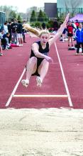 Makinley Hammitt took 6th place in the long jump at the Titan Invitational April 11. Photo by Peterman Sports Photography stevepeterman5@gmail.com