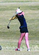 Katie Betsworth earned a 3rd place finish in her first ever varsity meet April 11 in Beresford. Photo by Squier Designs