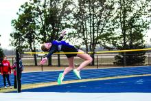 Jorja VanDenHul tied for 2nd place at the Husky Invite with a jump of 4’10”. Photo by Peterman Sports Photography • stevepeterman5@gmail.com