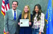 Grace Griffin, middle, is pictured with Governor Kristi Noem, right. She attended the Governor’s banquet celebrating the top academic one percent of students in South Dakota. Submitted photo