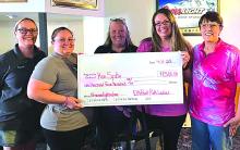 The Elk Point Pink Ladies are all about raising money and supporting local families fighting cancer in the Elk Point Jefferson School District. On April 12, they had the honor to present Ron Spike with $1,500 and a donation bag. Spike is currently fighting Kidney Cancer. Submitted photo