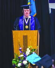 At Dakota Valley graduation ceremonies May 13, the DV High School Choir, left, sang 'I Am Still Your Dreamer' by Pink Zebra. Joshua Ganschow, right, gave a commencement address during the ceremony. More photos on page 14. Photo by Peterman Photography • stevepeterman5@gmail.com