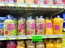 JB Popcorn is finding a home on shelves in local stores throughout the area. Most recently they have been added to Jones Food Center, Riverside Fareway and Coffee Cup Travel Plaza. Photo by Beth Sherard-Hutcheson • times1reporter@gmail.com