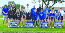Posing for a picture before heading to the state track and field meet in Sioux Falls Thursday, May 25, were front from left, Josie Curry, Alyssa Chytka, Grace Peed, Kaitlyn VanRoekel, Lauren McDermott, Cera Schmitz, Makinley Hammitt, Paige Jacobs and Molli Harkin; and back, Coach Jake Terry, Joe Cross, Bentlee Kollbaum, Landon Johnsen, Coach Steve Cross, Coach Brett Reed, Coach Jeff Zeller, Coach Stacie Sheley and Coach Alicia Loiland. Submitted photo