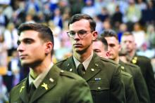 Richard “Brad” Wagner ’23 marches alongside fellow cadets into Cameron Hall for the joint commissioning ceremony. VMI Photo by H. Lockwood McLaughlin