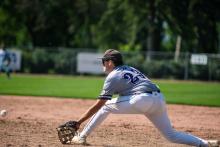 Brendan Barnett stretches to get the out at first base against Flandreau. Photo by Peterman Sports Photography • stevepeterman5@gmail.com