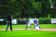 Levi Hanson catches and tags out the West Central runner during the State A VFW 14U Baseball tournament July 21-23. Photo by Peterman Sports Photography • stevepeterman5@gmail.com
