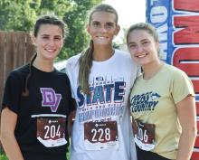 On the female side of the race, winners were, from left, first place Sophia Redler, second place Brooks Rose and third place Ginny Clark. Photo by Peterman Sports Photography • stevepeterman5@gmail.com